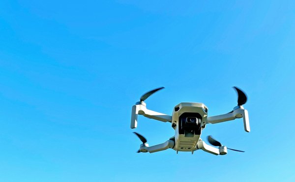 What specific measures should a UK-based drone delivery service adopt to comply with Civil Aviation Authority regulations?